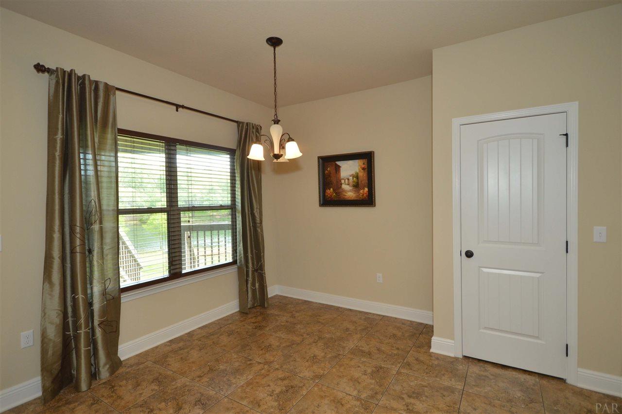759 Lake Ridge Lane Pensacola, FL 32514 - Photo 18 of 43 a view of an empty room with a window