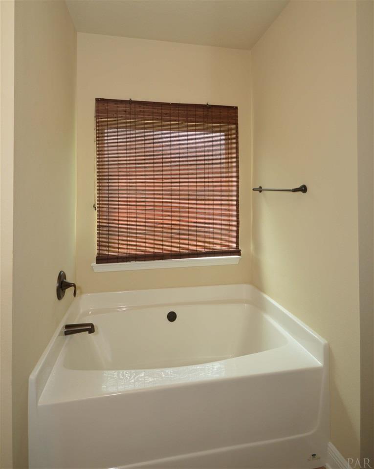759 Lake Ridge Lane Pensacola, FL 32514 - Photo 25 of 43 a bathroom with a bathtub