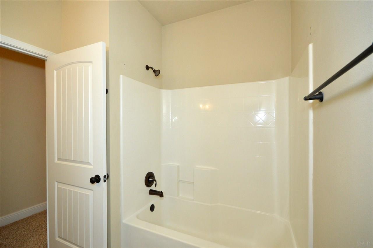 759 Lake Ridge Lane Pensacola, FL 32514 - Photo 31 of 43 a bathroom with a bathtub
