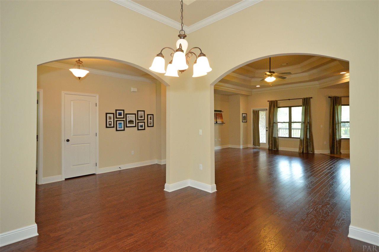759 Lake Ridge Lane Pensacola, FL 32514 - Photo 10 of 43 a view of a room with wooden floor