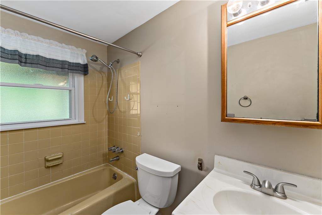 27 Dover Road Irwin, PA 15642 - Photo 20 of 43 a bathroom with a sink a toilet and shower