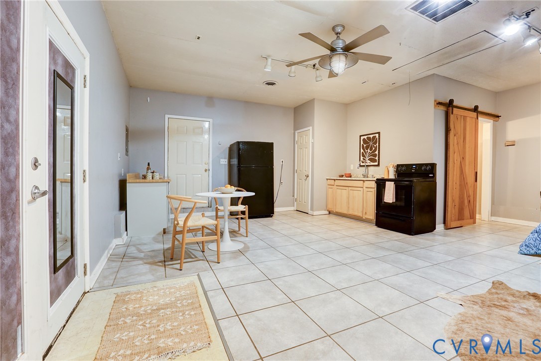 661 Greencastle Road Chesterfield, VA 23236 - Photo 23 of 28 a living room with furniture a table and chairs
