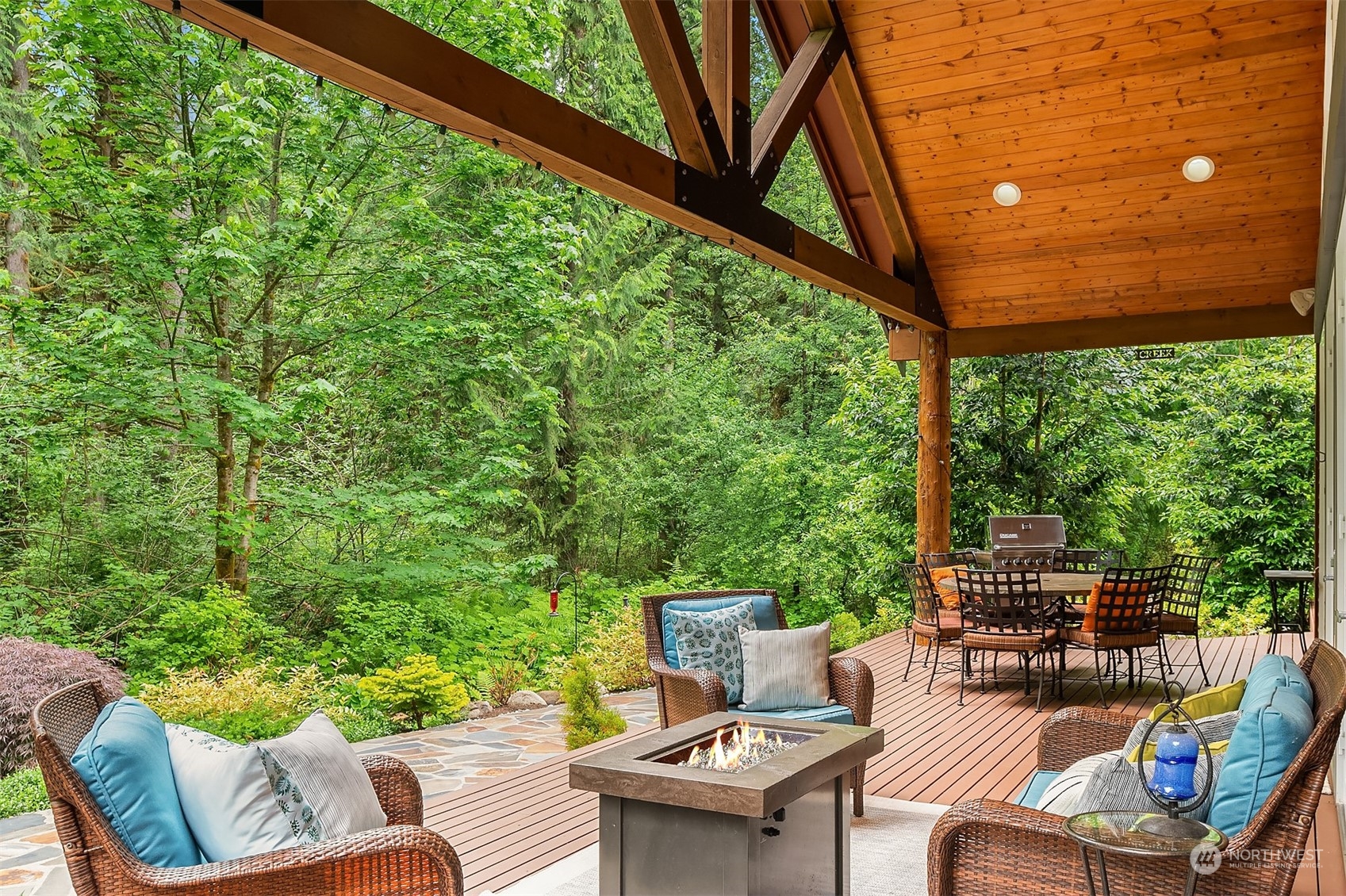 11417 Kelly Road Northeast Carnation, WA 98014 - Photo 11 of 39 a outdoor living space with furniture and garden view