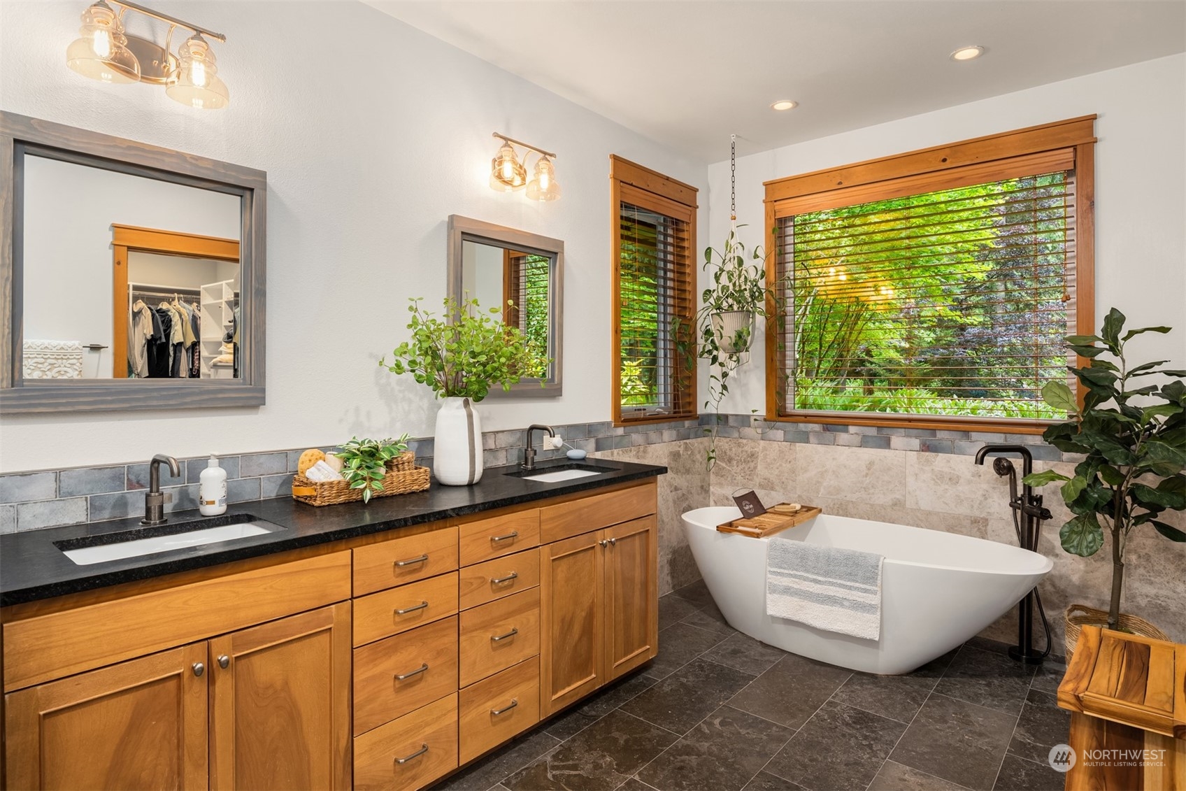 11417 Kelly Road Northeast Carnation, WA 98014 - Photo 13 of 39 a spacious bathroom with double vanity and a bathtub