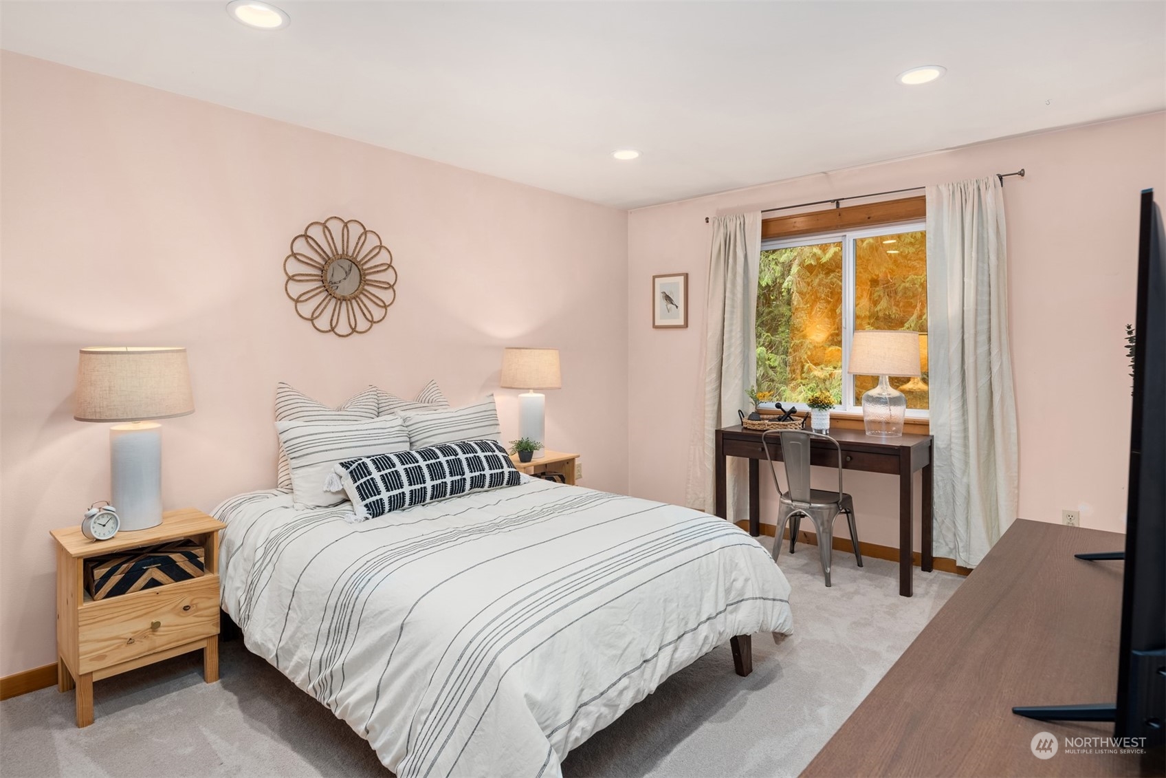 11417 Kelly Road Northeast Carnation, WA 98014 - Photo 16 of 39 a bedroom with a bed and a table in it with window