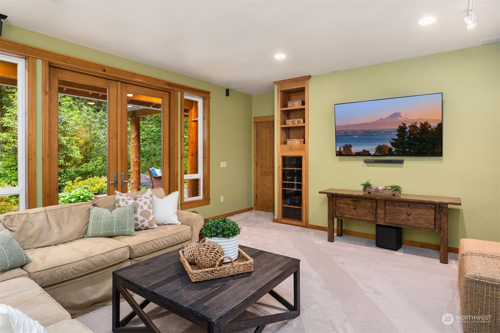 11417 Kelly Road Northeast Carnation, WA 98014 - Photo 19 of 39 a living room with furniture and a flat screen tv