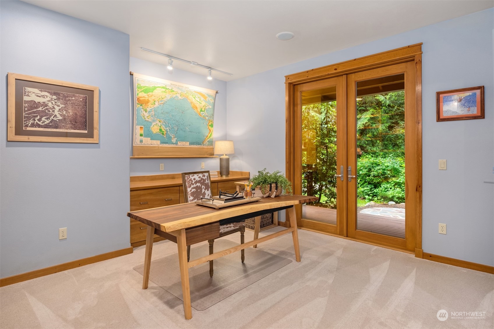 11417 Kelly Road Northeast Carnation, WA 98014 - Photo 20 of 39 a view of a workspace with furniture and a window