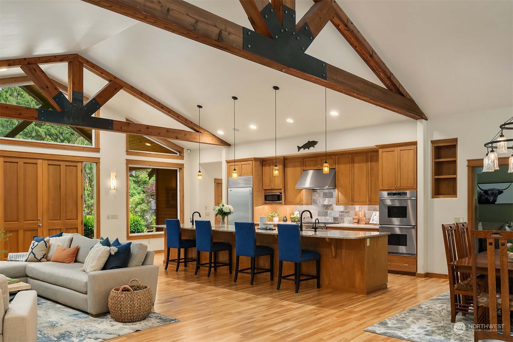 11417 Kelly Road Northeast Carnation, WA 98014 - Photo 36 of 39 a living room with lots of furniture and kitchen view