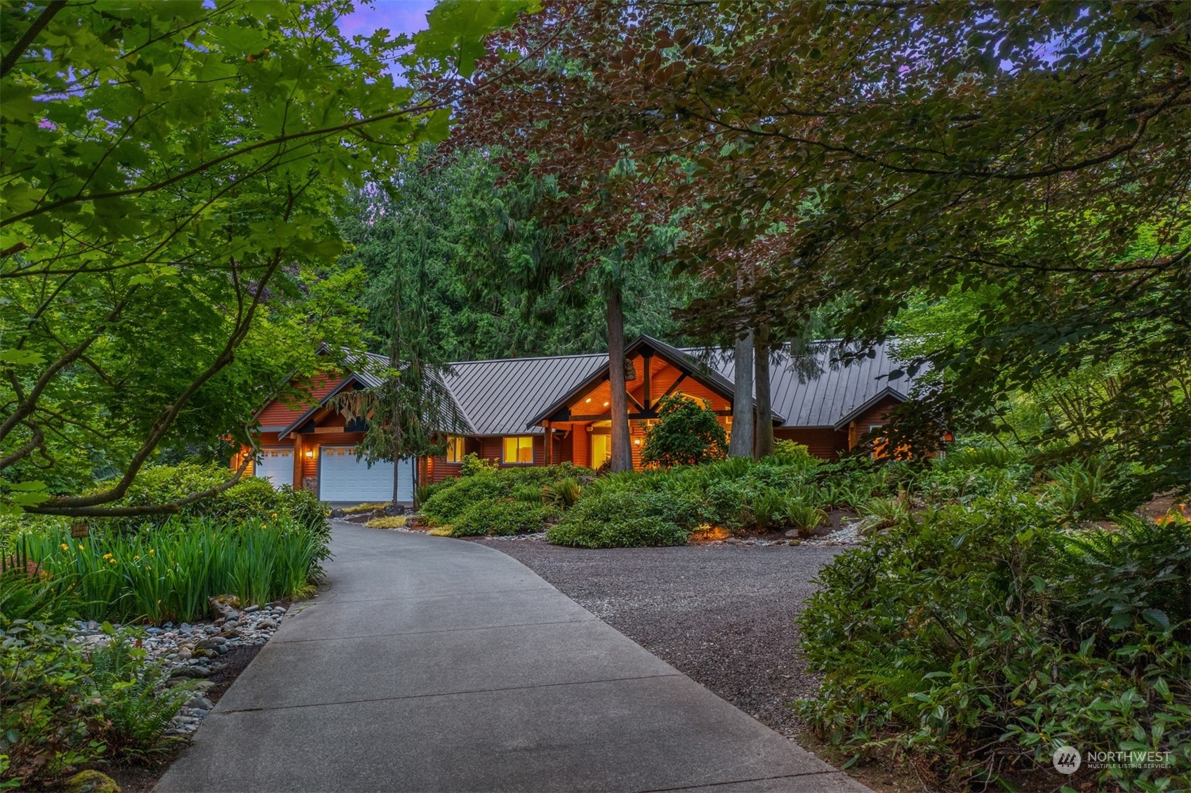 11417 Kelly Road Northeast Carnation, WA 98014 - Photo 37 of 39 a front view of a house with a yard and tree s