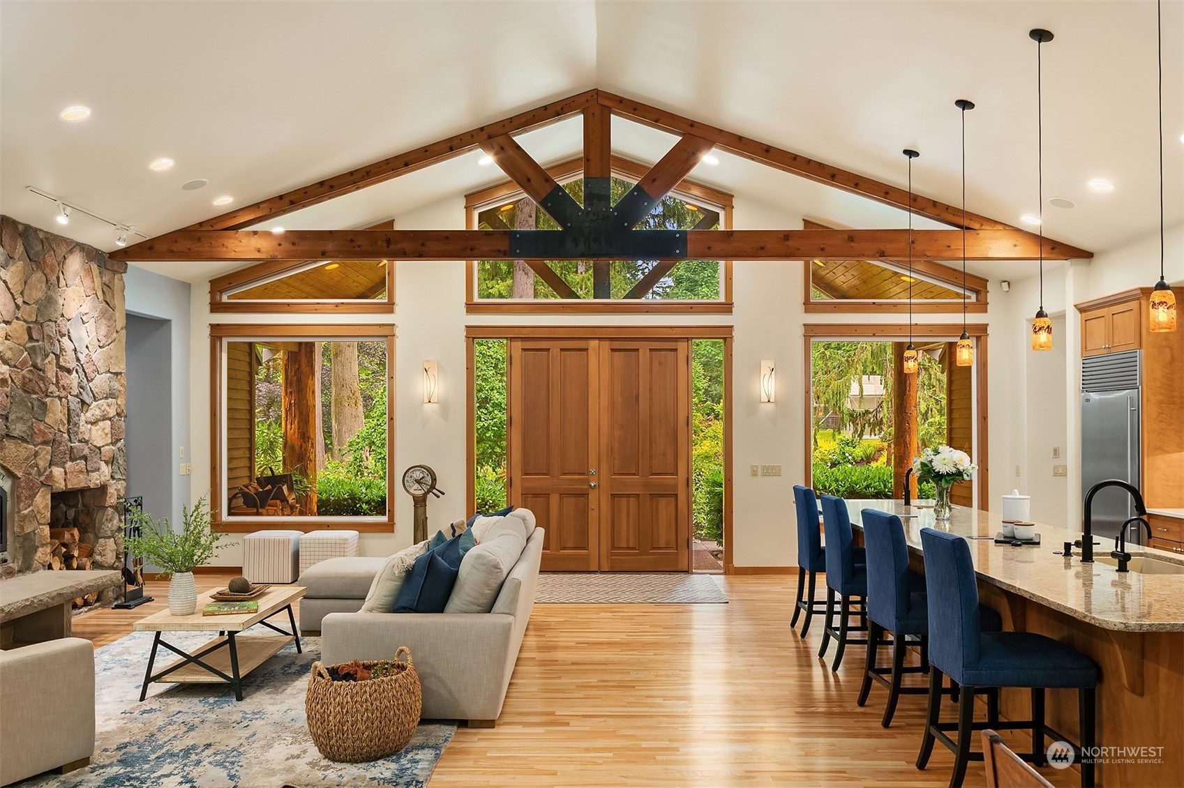 11417 Kelly Road Northeast Carnation, WA 98014 - Photo 10 of 39 a living room with furniture and floor to ceiling windows