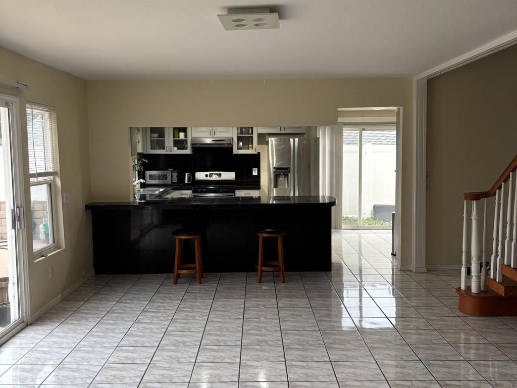 5191 Bothe Avenue University City, CA 92122 - Photo 11 of 29 a view of kitchen with refrigerator and window