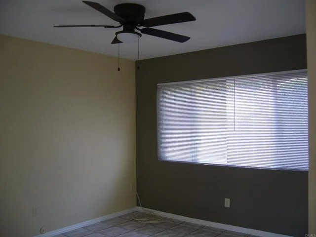 a view of a window in an empty room