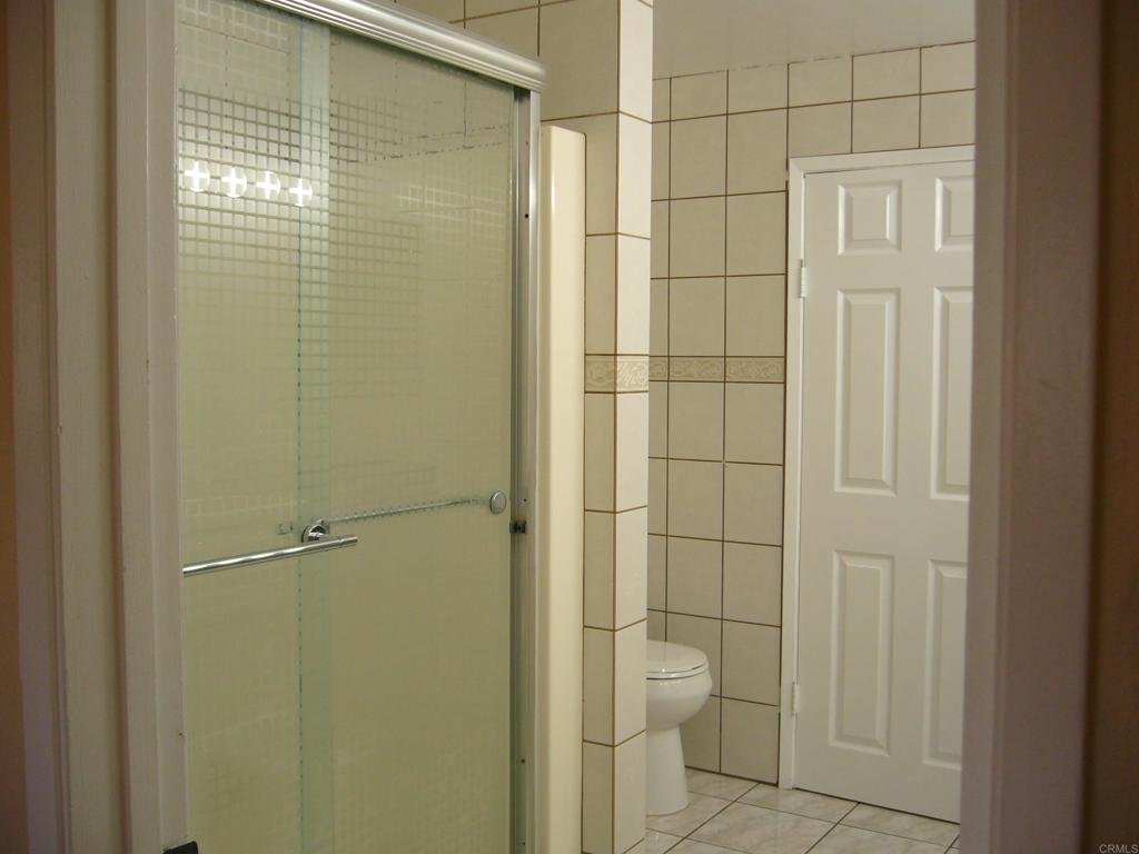 5191 Bothe Avenue University City, CA 92122 - Photo 20 of 29 a bathroom with a toilet and a shower