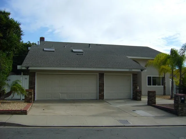 front view of a house with a garage