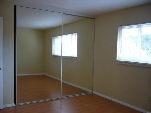 an empty room with windows
