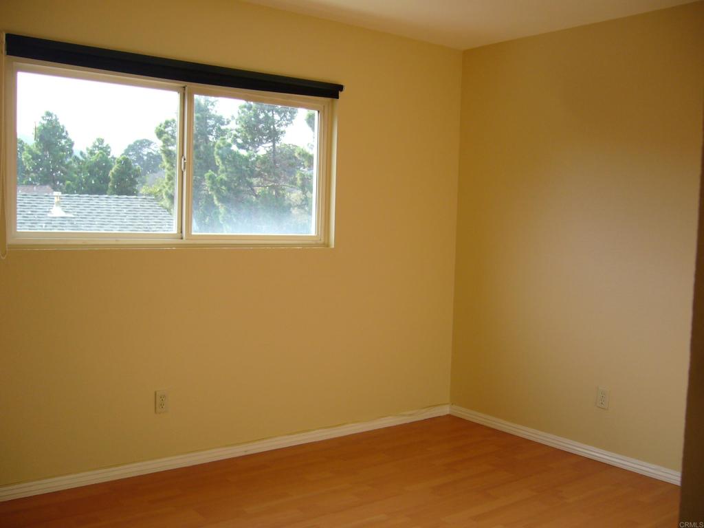 5191 Bothe Avenue University City, CA 92122 - Photo 27 of 29 a view of a small space with wooden floor and a window