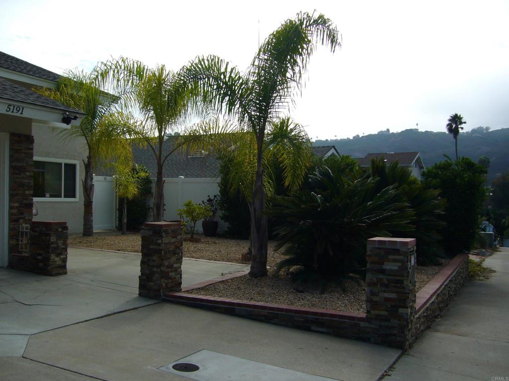 5191 Bothe Avenue University City, CA 92122 - Photo 3 of 29 a view of a terrace with a bench in a patio