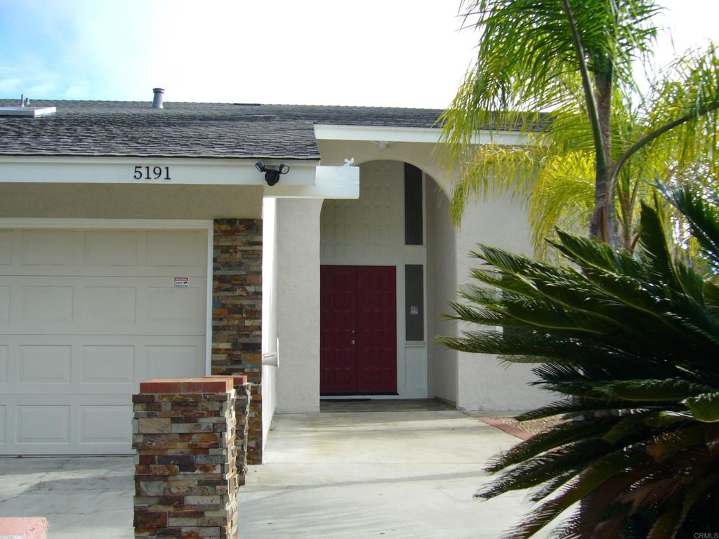 5191 Bothe Avenue University City, CA 92122 - Photo 4 of 29 a front view of a house with a garden