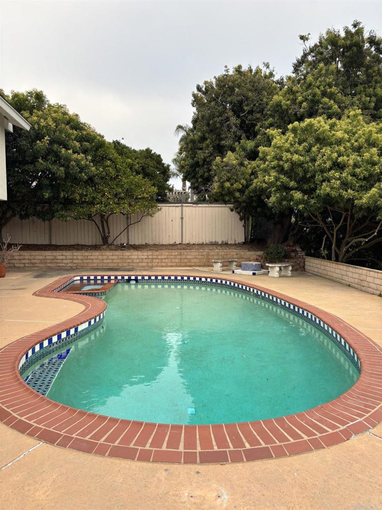 5191 Bothe Avenue University City, CA 92122 - Photo 6 of 29 a view of a swimming pool with a backyard