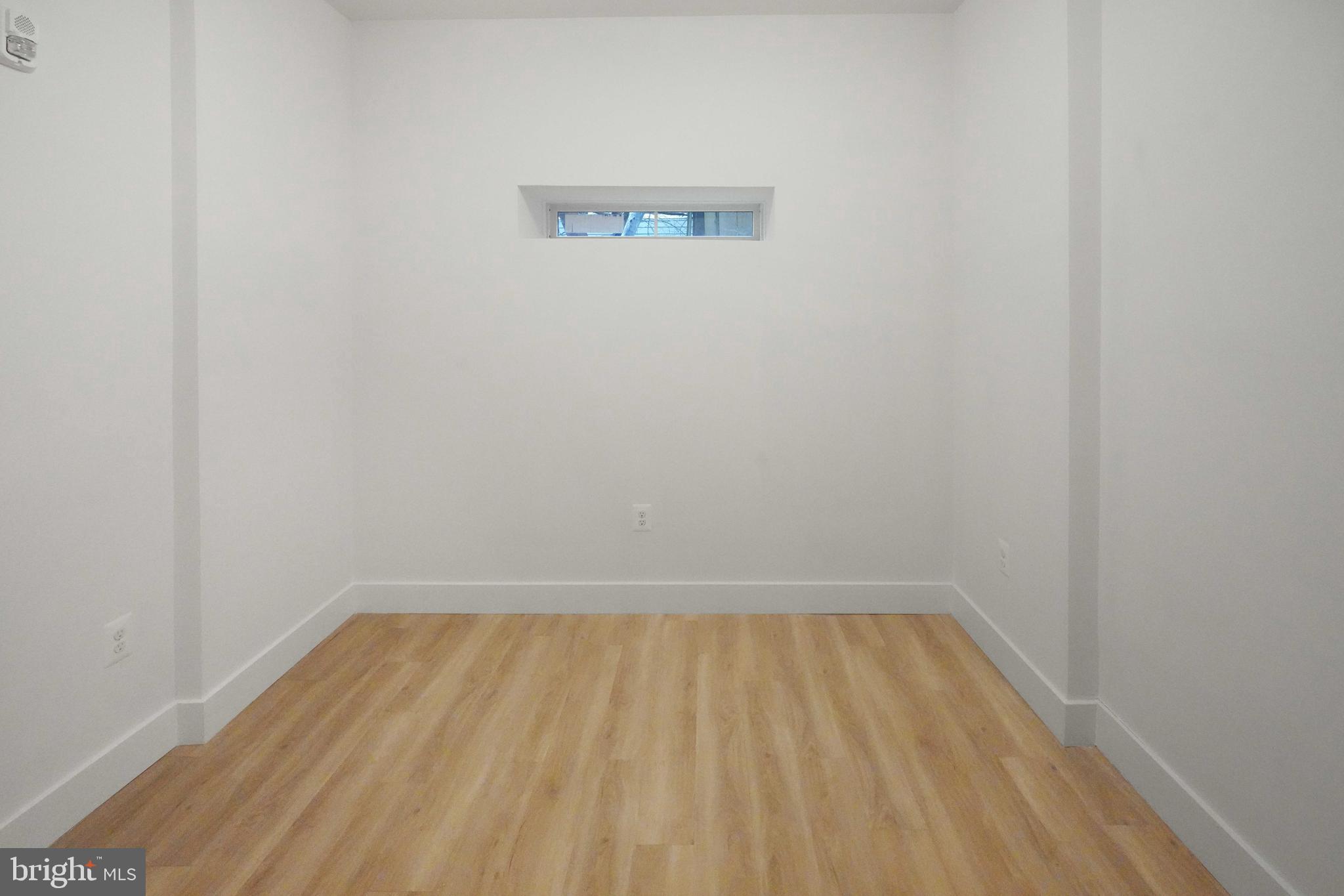 2310 4th Street Northeast, Unit 2 Washington, DC 20002 - Photo 7 of 31 a view of room with wooden floor