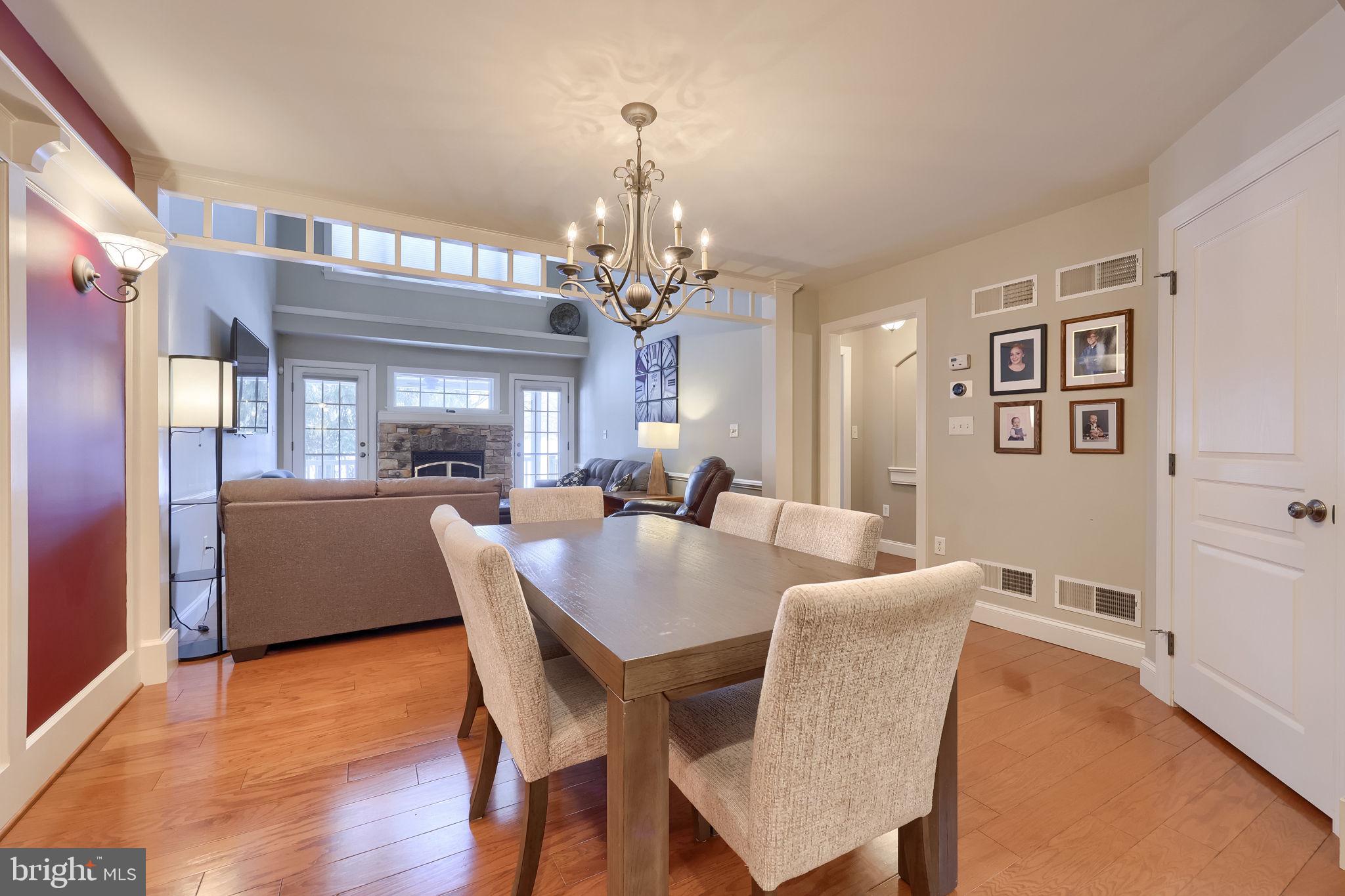 147 Fieldcrest Lane Ephrata, PA 17522 - Photo 12 of 47 a view of a dining room with furniture and chandelier