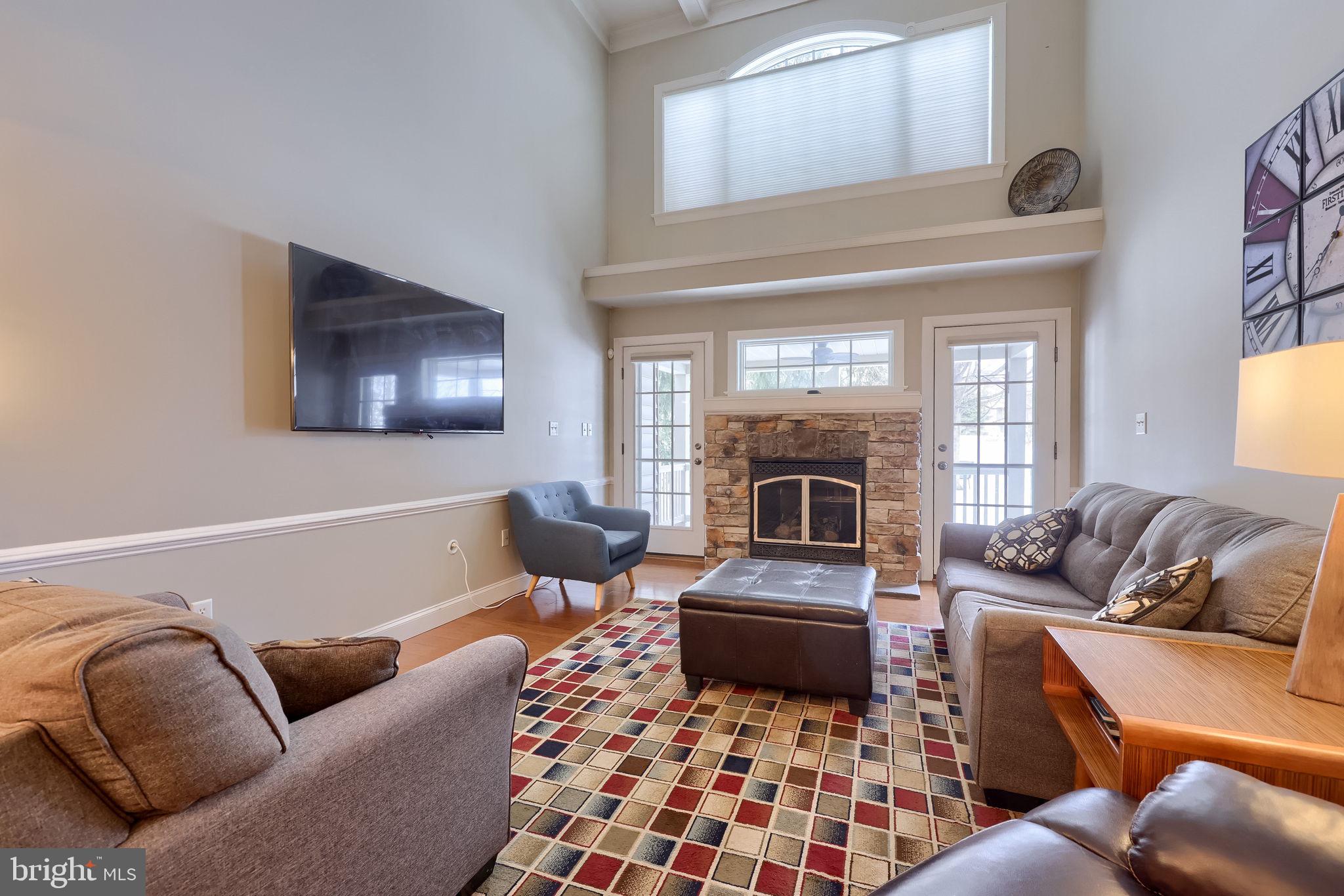 147 Fieldcrest Lane Ephrata, PA 17522 - Photo 17 of 47 a living room with furniture and a fireplace