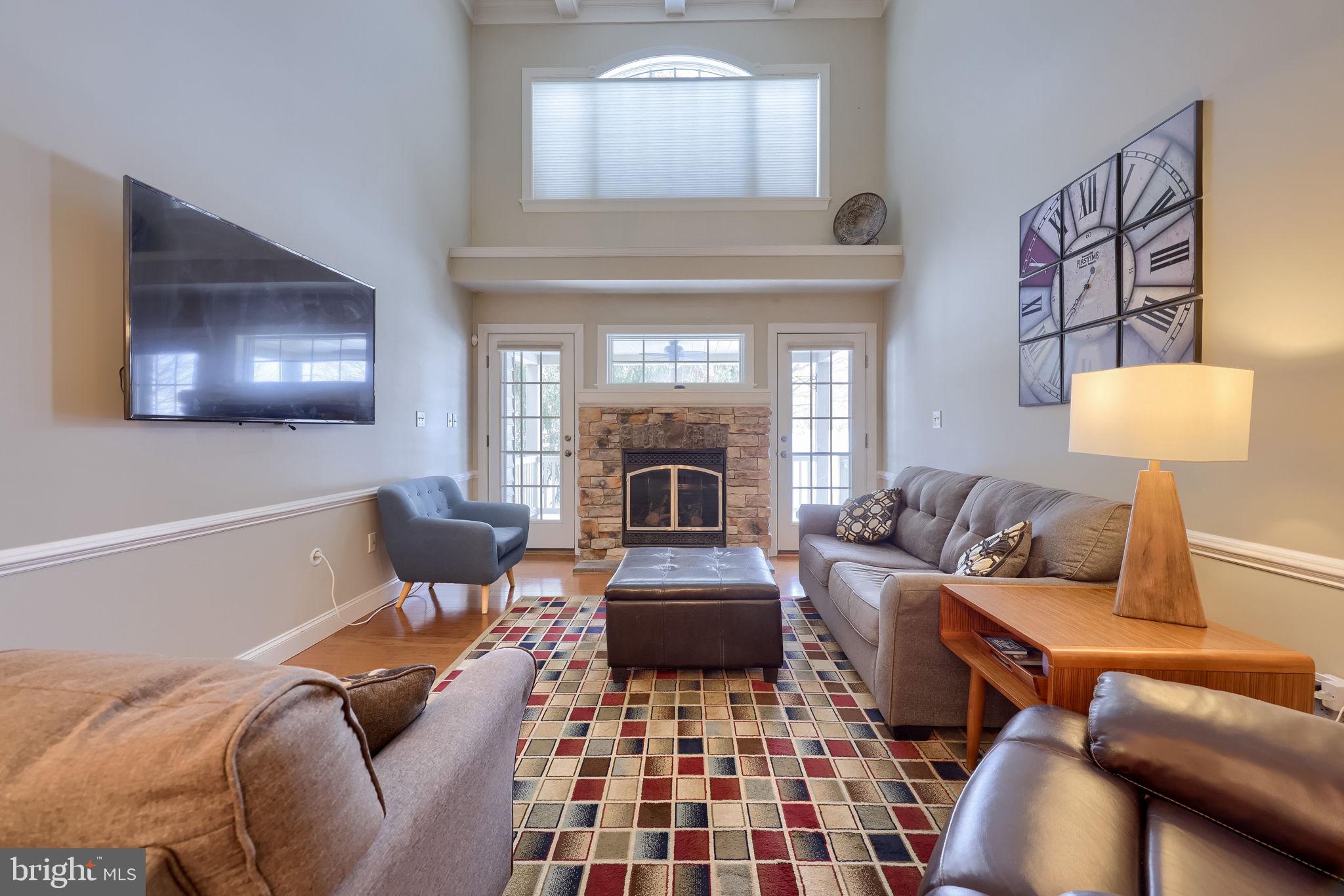 147 Fieldcrest Lane Ephrata, PA 17522 - Photo 18 of 47 a living room with furniture and a fireplace