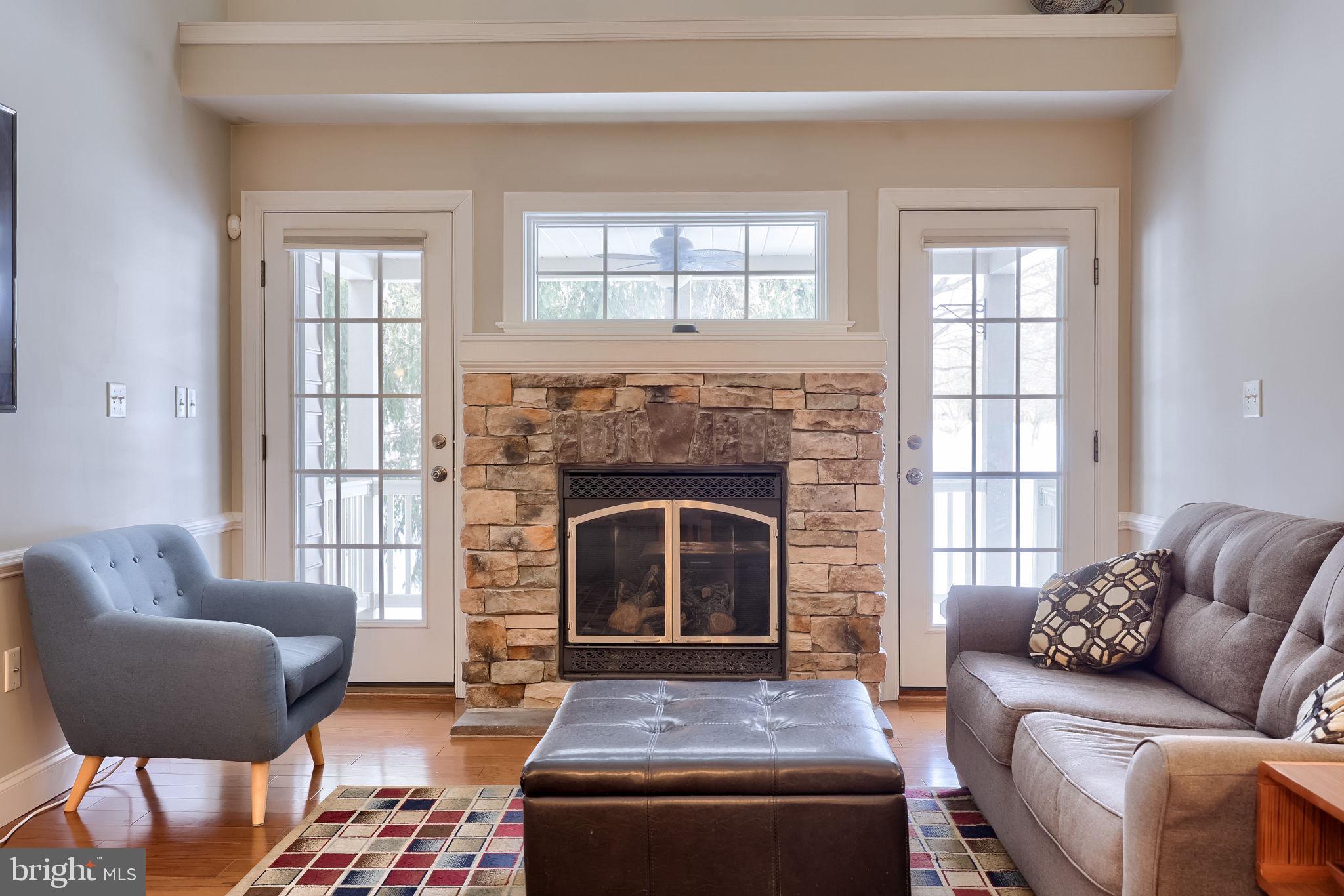 147 Fieldcrest Lane Ephrata, PA 17522 - Photo 19 of 47 a living room with furniture and a fireplace