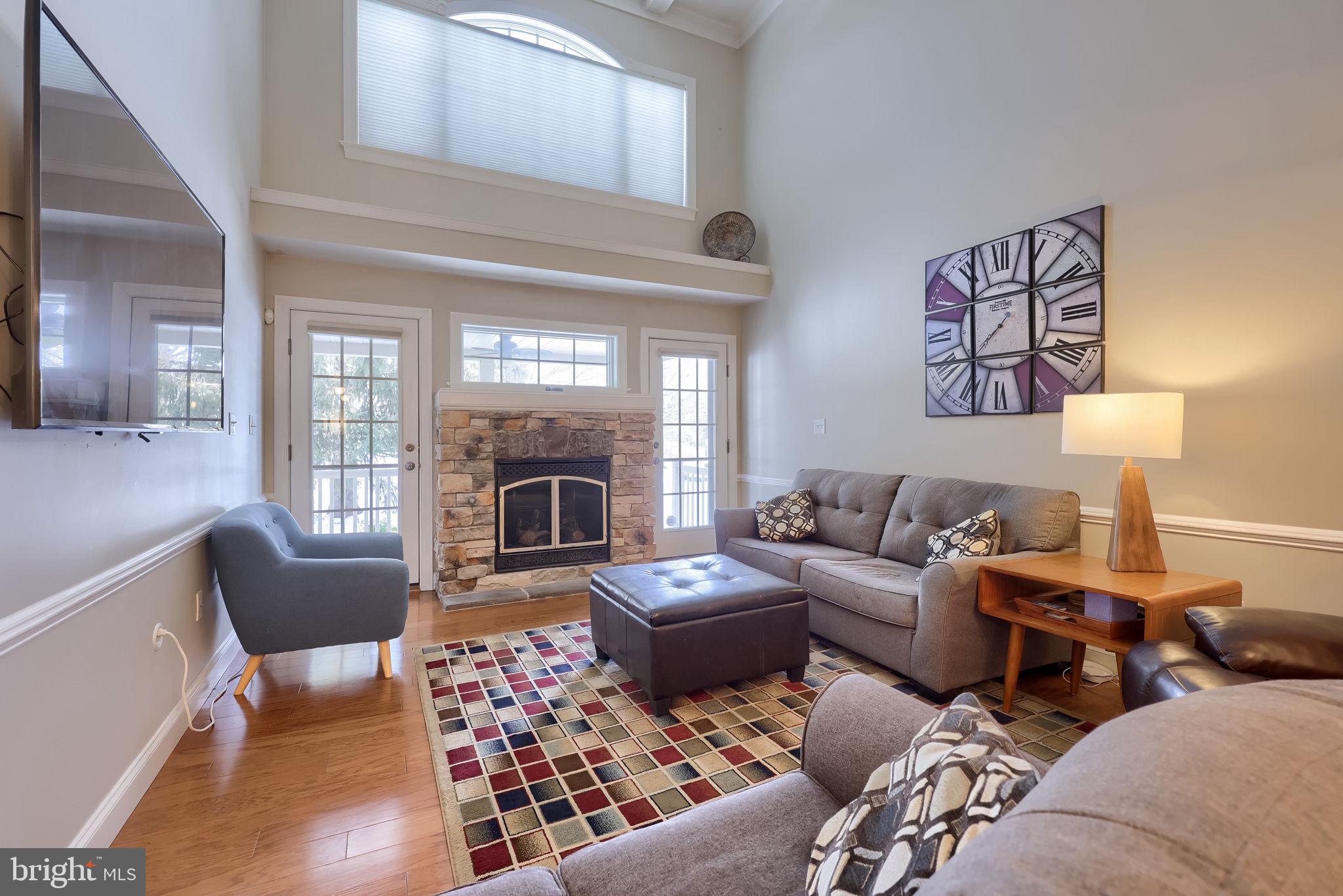 147 Fieldcrest Lane Ephrata, PA 17522 - Photo 20 of 47 a living room with furniture fireplace and wooden floor