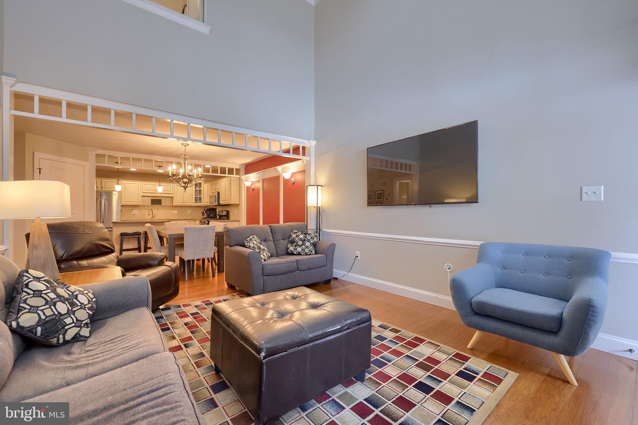 147 Fieldcrest Lane Ephrata, PA 17522 - Photo 22 of 47 a living room with furniture and a flat screen tv