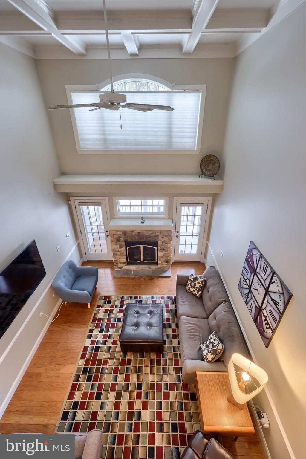 147 Fieldcrest Lane Ephrata, PA 17522 - Photo 28 of 47 a living room with furniture and a chandelier