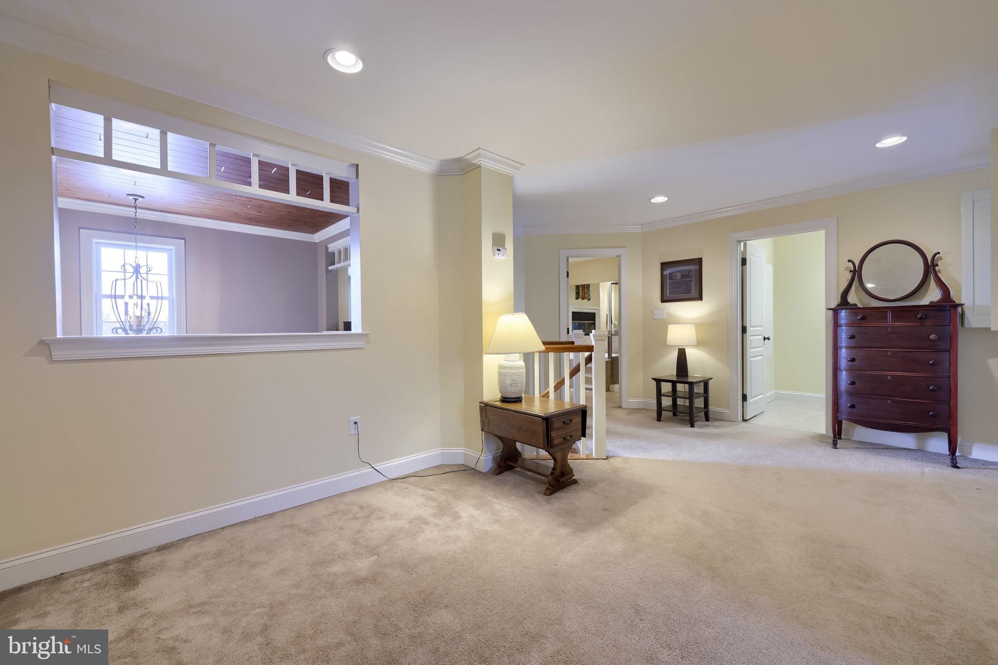 147 Fieldcrest Lane Ephrata, PA 17522 - Photo 31 of 47 a living room with furniture gym equipment and a window