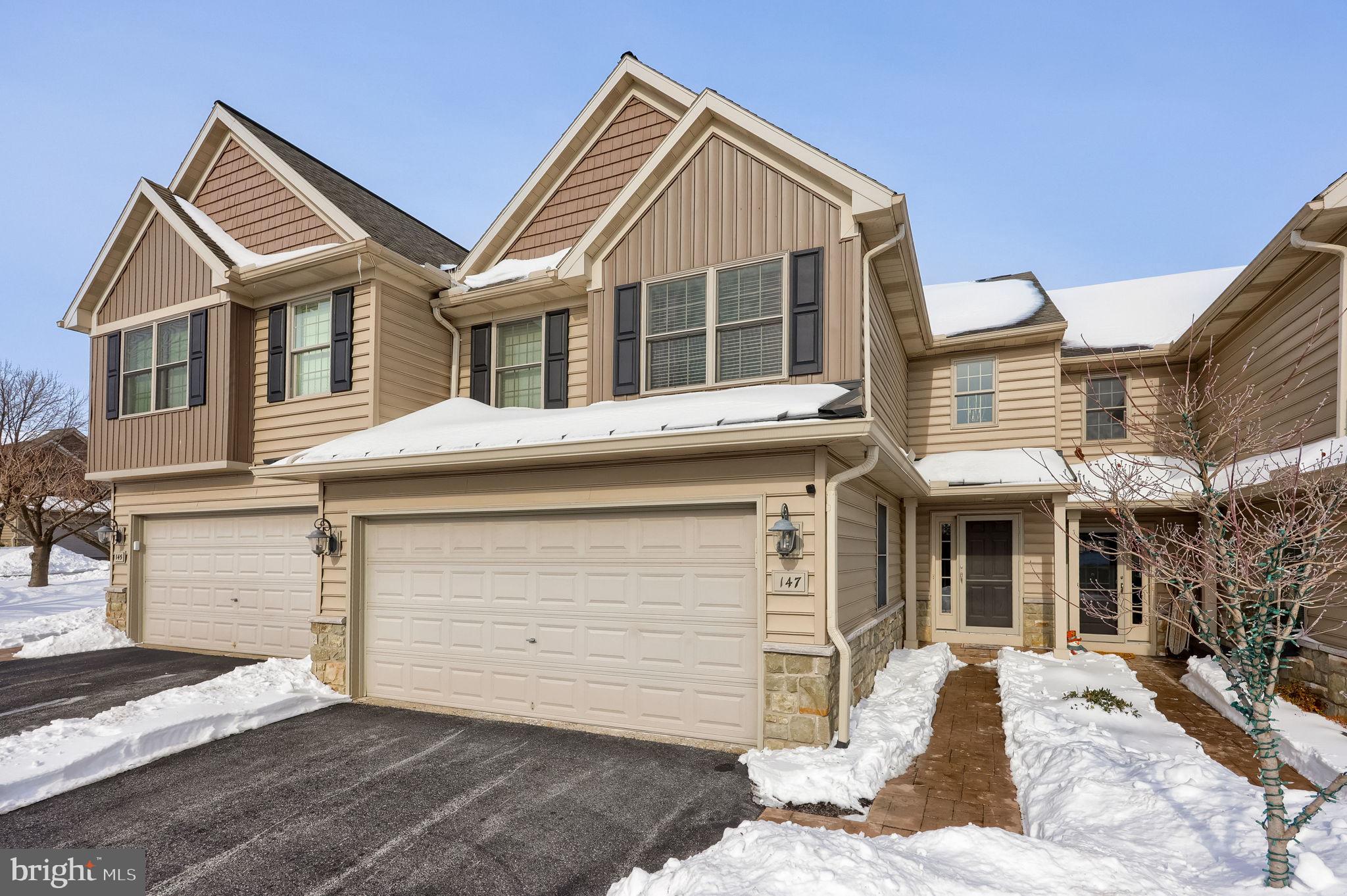 147 Fieldcrest Lane Ephrata, PA 17522 - Photo 4 of 47 a view of a white house with large windows