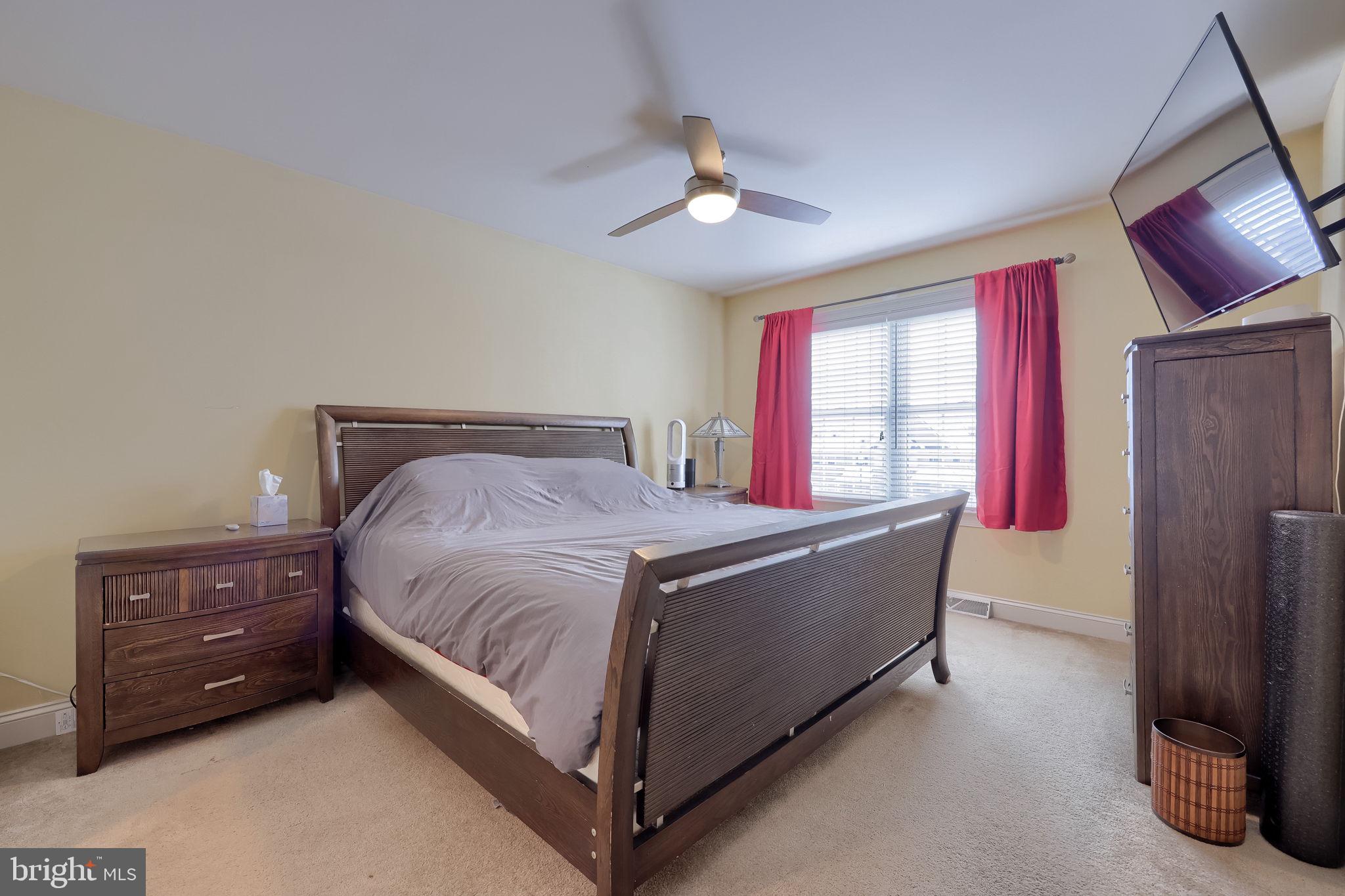 147 Fieldcrest Lane Ephrata, PA 17522 - Photo 41 of 47 a bed sitting in a room next to a window