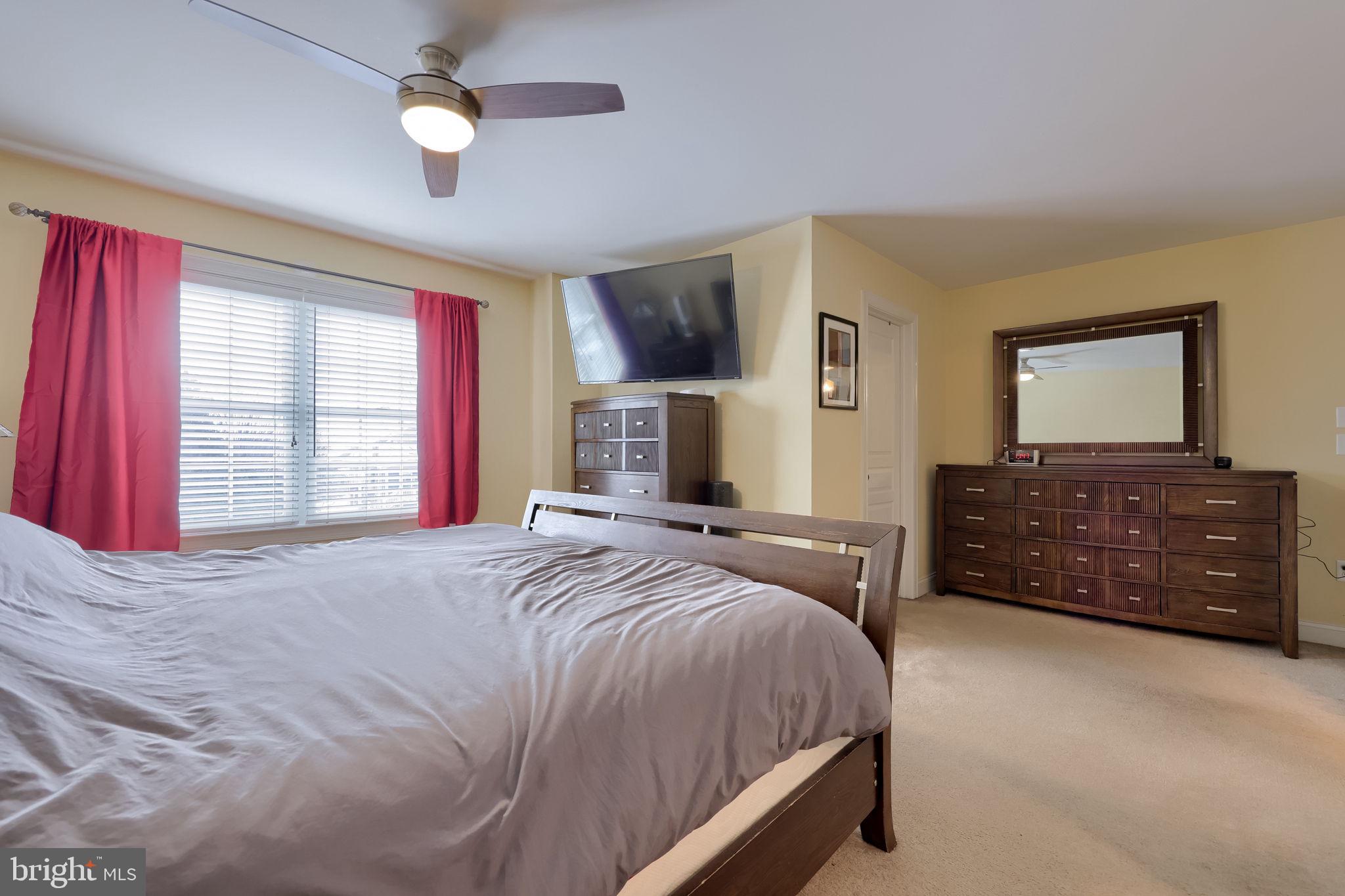 147 Fieldcrest Lane Ephrata, PA 17522 - Photo 42 of 47 a bedroom with a bed and a television