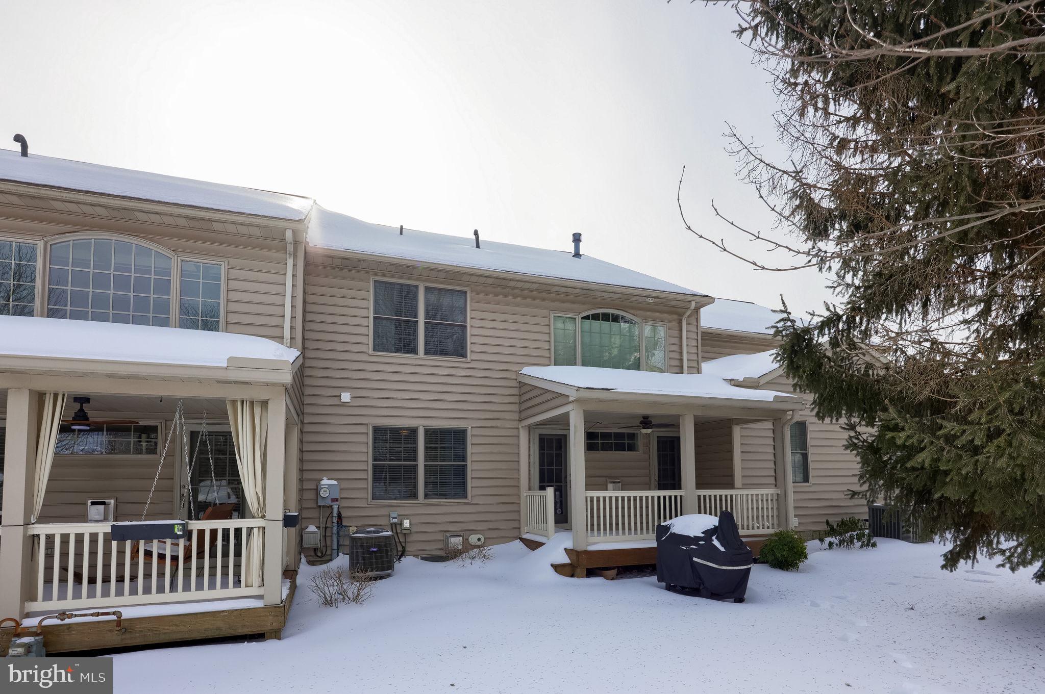 147 Fieldcrest Lane Ephrata, PA 17522 - Photo 46 of 47 a view of a house with a barbeque grill and wooden fence
