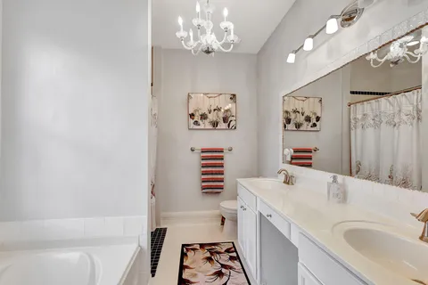 a view of a bathroom with a shower and a curtain