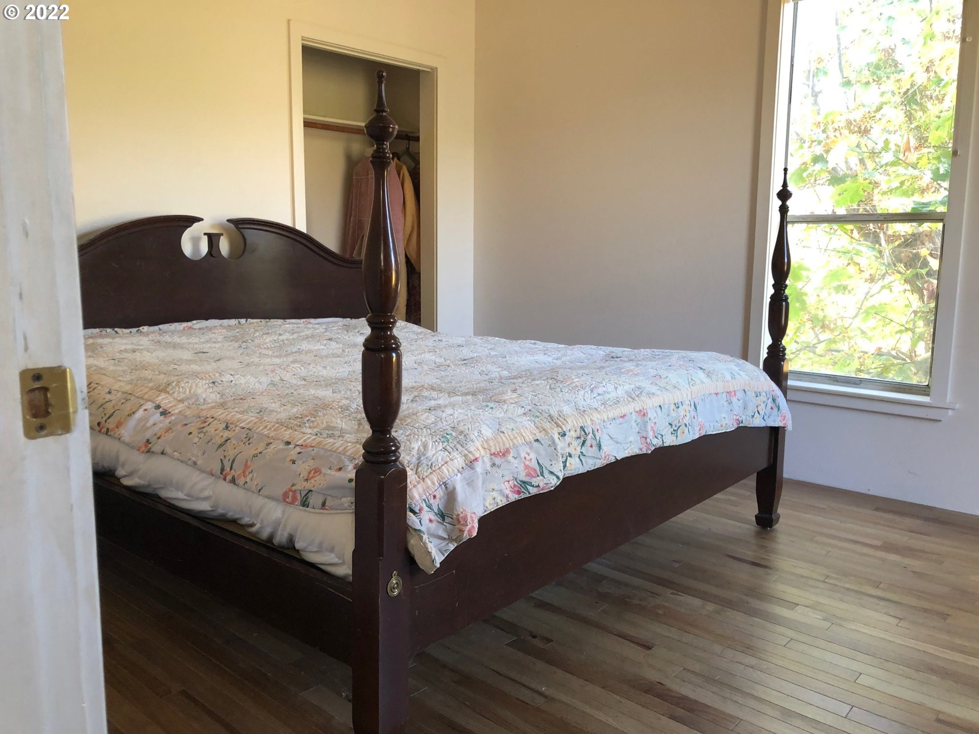 4097 Canyonville-Riddle Road Riddle, OR 97469 - Photo 14 of 31 a bed sitting in a bedroom next to a window