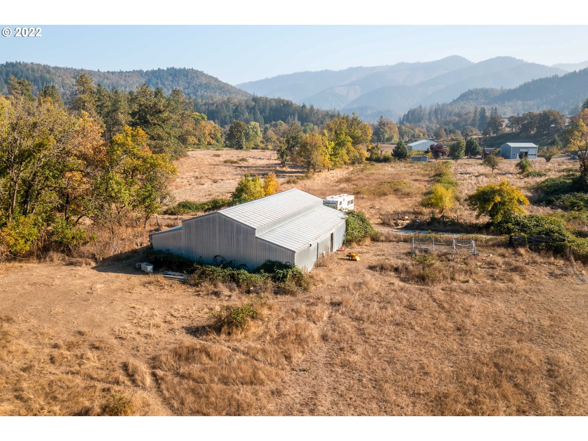 4097 Canyonville-Riddle Road Riddle, OR 97469 - Photo 23 of 31 a view of a mountain with an outdoor space
