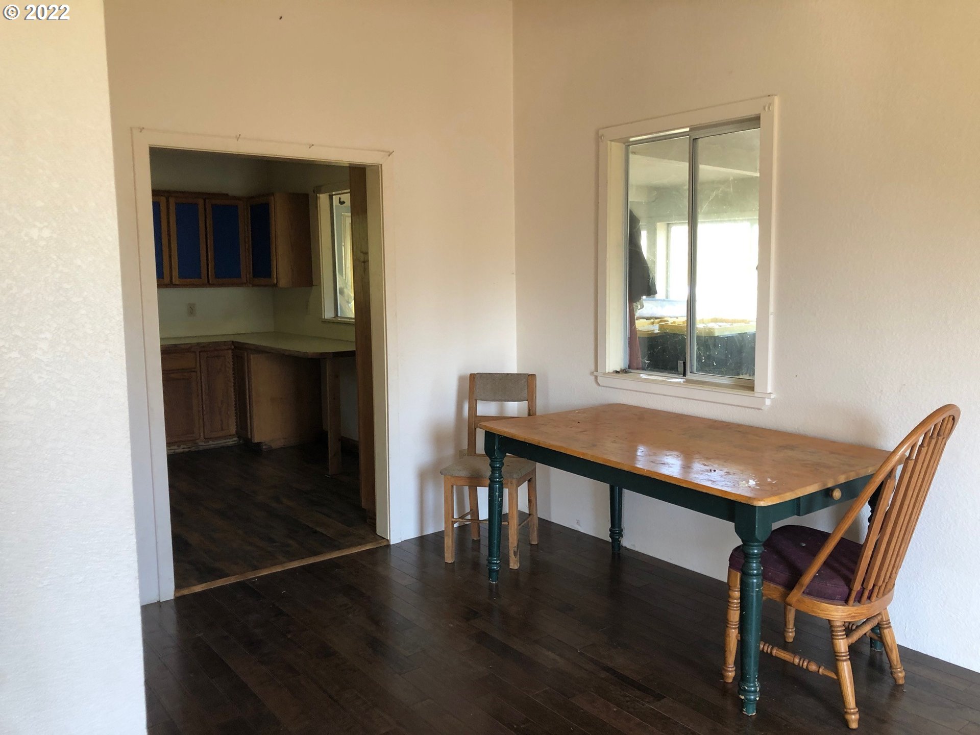 4097 Canyonville-Riddle Road Riddle, OR 97469 - Photo 6 of 31 a view of a workspace with furniture and wooden floor