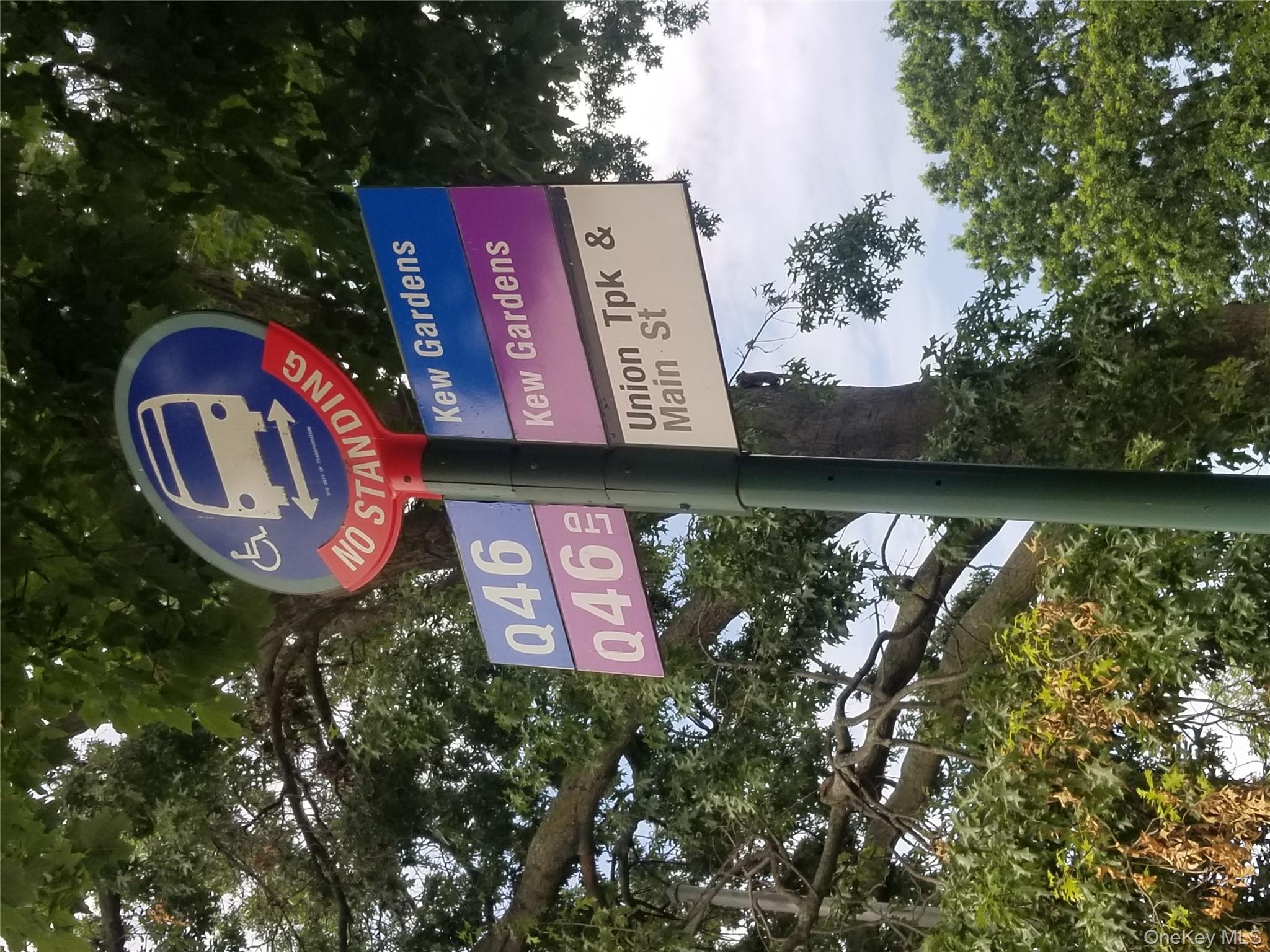 78-11 Main Street, Unit 1G Queens, NY 11367 - Photo 13 of 15 a sign that is on a pole