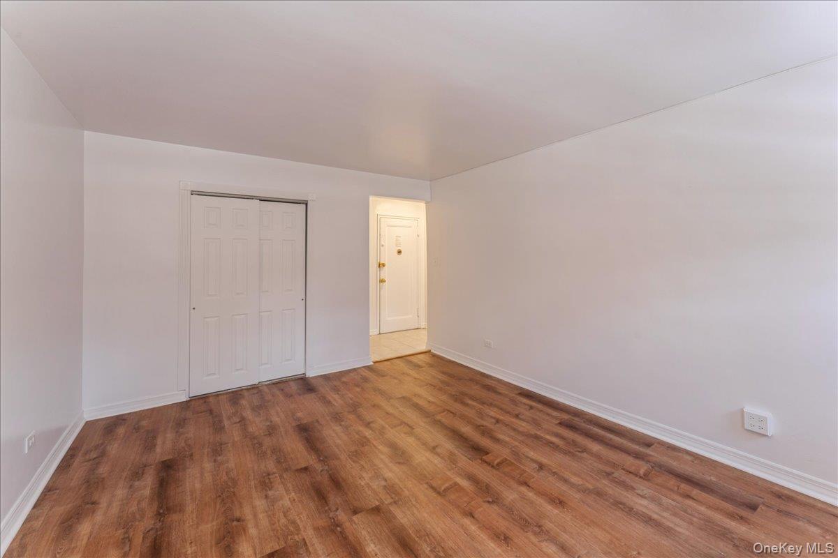 78-11 Main Street, Unit 1G Queens, NY 11367 - Photo 2 of 15 a view of an empty room