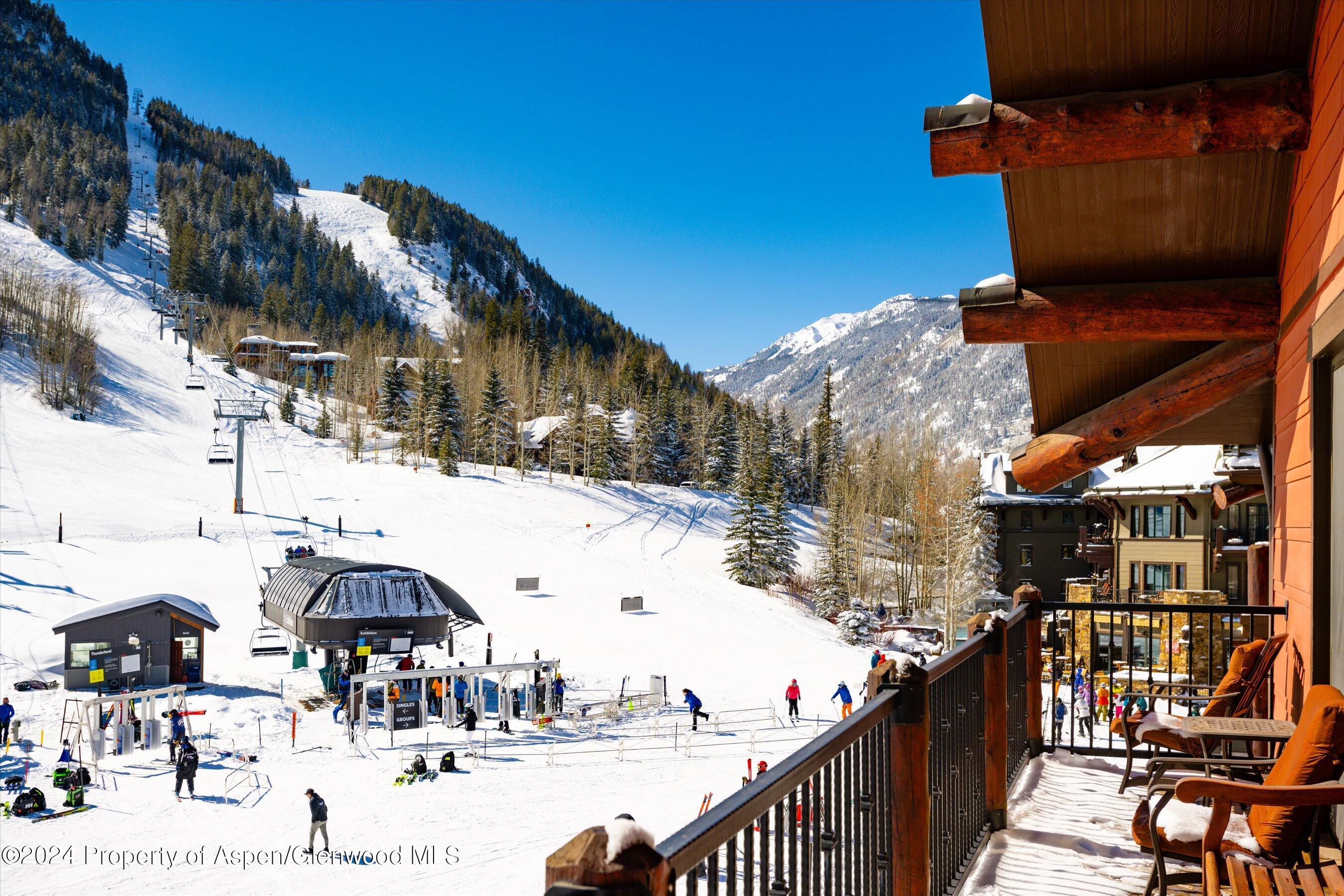 133 Prospector Road, Unit 43016 Aspen, CO 81611 - Photo 1 of 21 a view of a street with houses