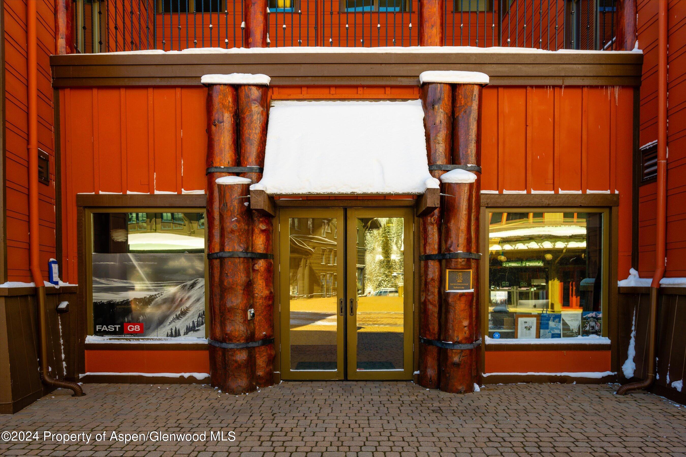 133 Prospector Road, Unit 43016 Aspen, CO 81611 - Photo 15 of 21 a view of a entrance door of the building