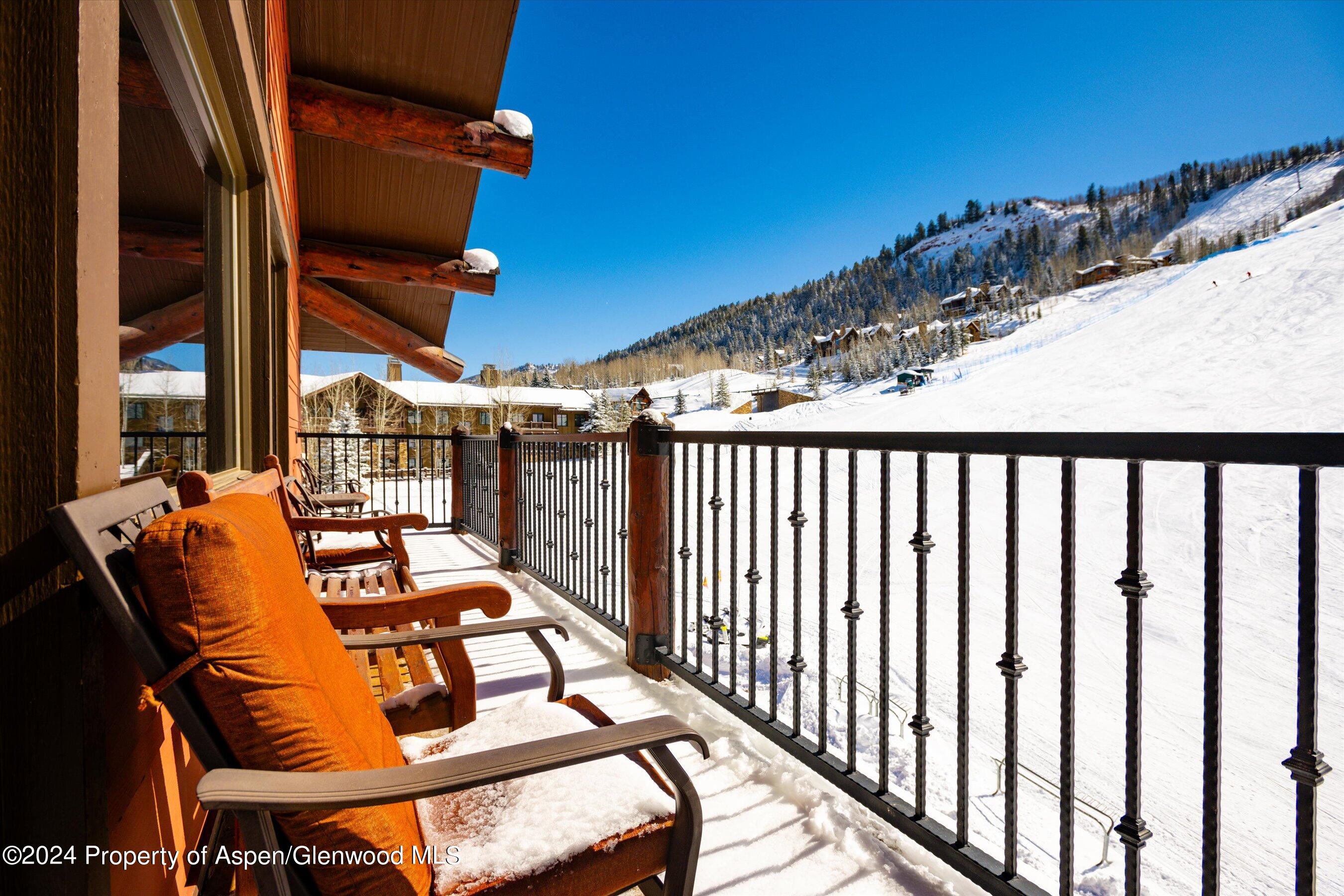 133 Prospector Road, Unit 43016 Aspen, CO 81611 - Photo 19 of 21 a view of a balcony with chairs