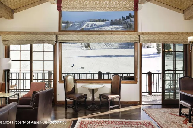 a view of a balcony with chairs
