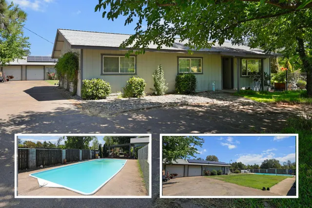 a view of front of house with a swimming pool