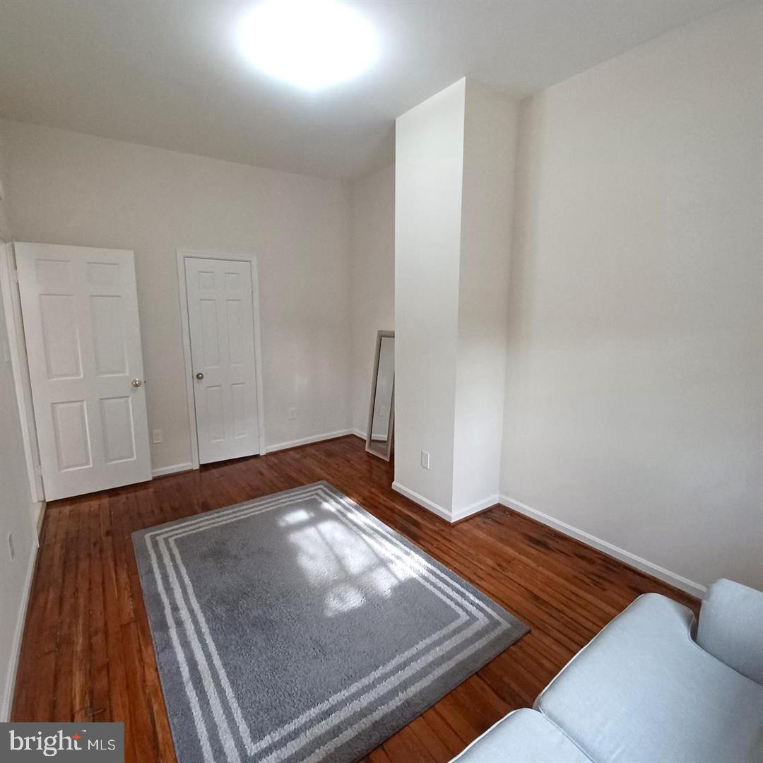 301 North West Street, Unit 1 Alexandria, VA 22314 - Photo 4 of 16 a view of an empty room