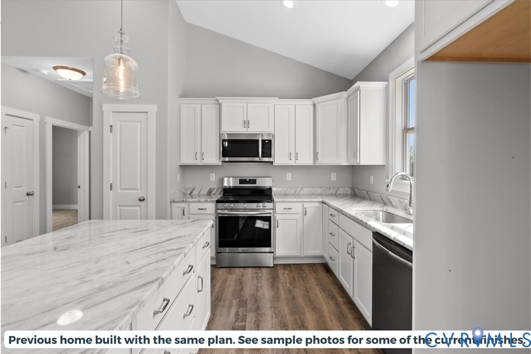 5712 Darlington Heights Road Farmville, VA 23901 - Photo 11 of 22 Kitchen with stainless steel appliances, white cab
