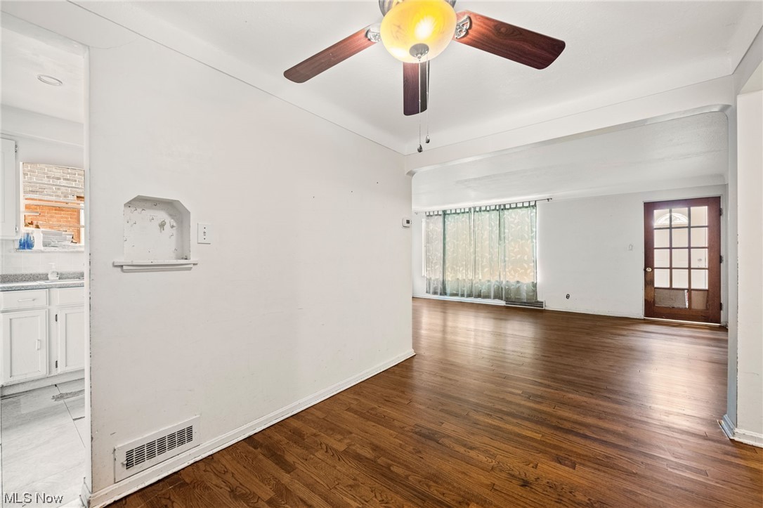3799 Colony Road South Euclid, OH 44118 - Photo 7 of 34 Spare room featuring ceiling fan and wood-type flooring